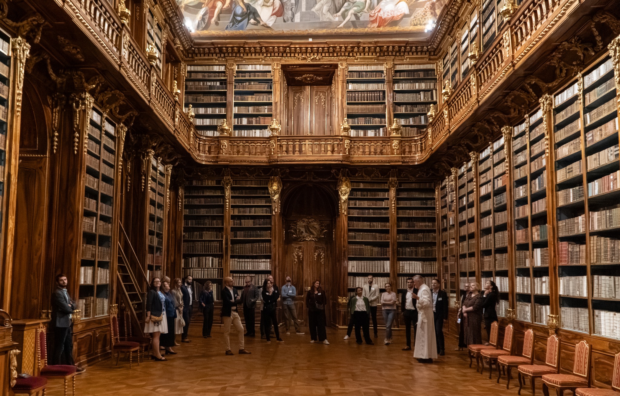 Event guests touring the ornate Strahov Library